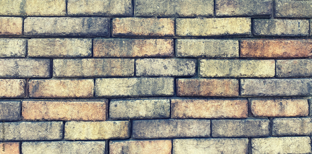 Fototapeta premium Close up of brick wall, example of facing material