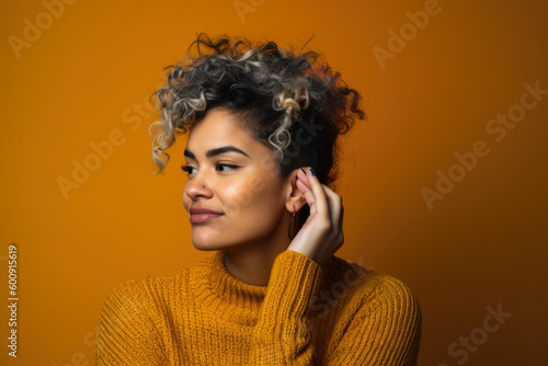Anxious woman with a nervous smile, fidgeting with her hair and glancing sideways against a brightly colored studio backdrop, generative ai photo