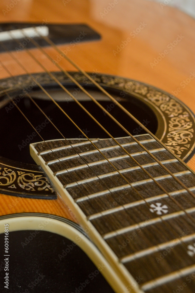Fototapeta premium detail of a wooden classical guitar