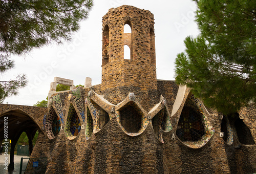 Exterior view of guell crypt, a masterpiece gaudi architecture located at catalunya outside town photo