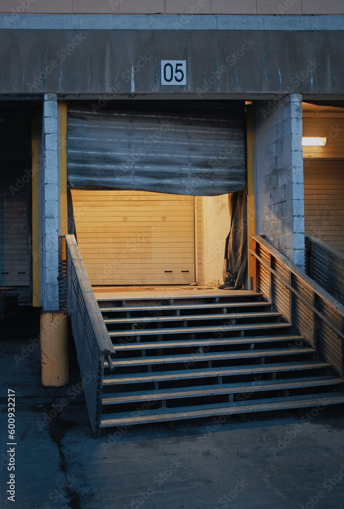 moody image of a modern concrete architecture during evening moody image of a modern concrete architecture during evening