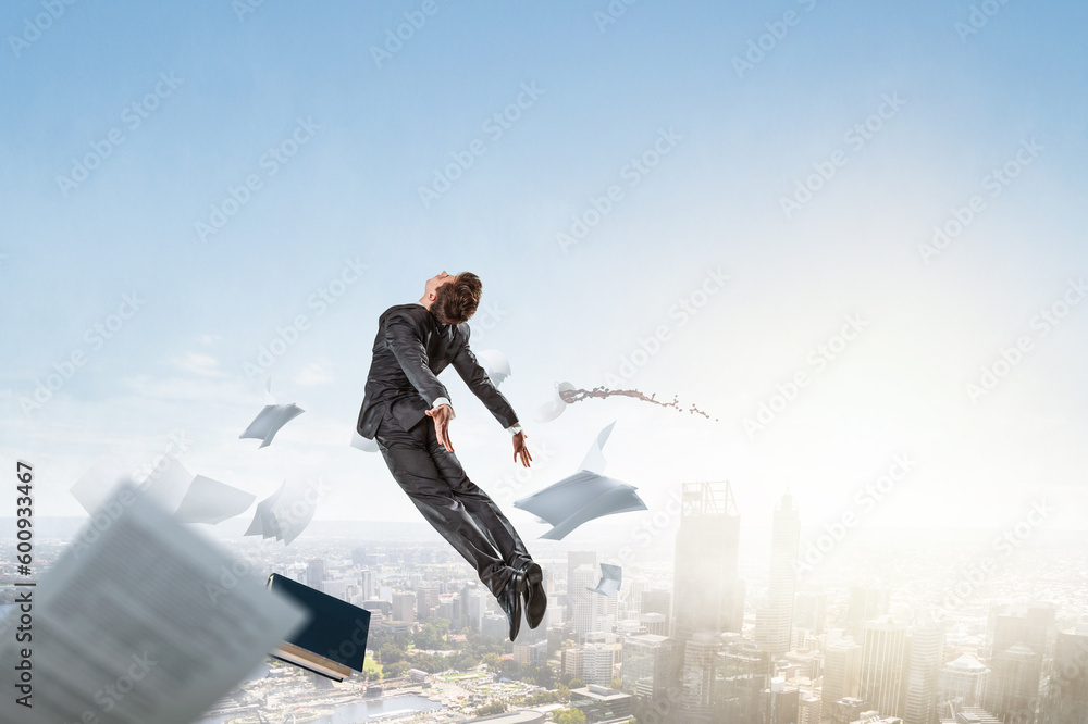 Business man flying up . Mixed media Business man flying up . Mixed media