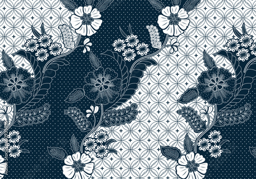 Batik Indonesian: is a technique of wax-resist dyeing applied to whole cloth, or cloth made using this technique originated from Indonesia. Batik is made either by drawing dots and lines