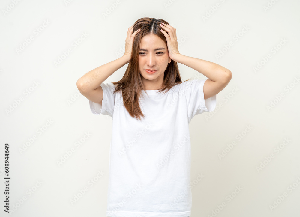 Young asian beautiful woman hand touching head she's feeling depressed stress headache be tired from working standing on isolated white background she has symptom office syndrome. Young asian beautiful woman hand touching head she's feeling depressed stress headache be tired from working standing on isolated white background she has symptom office syndrome.