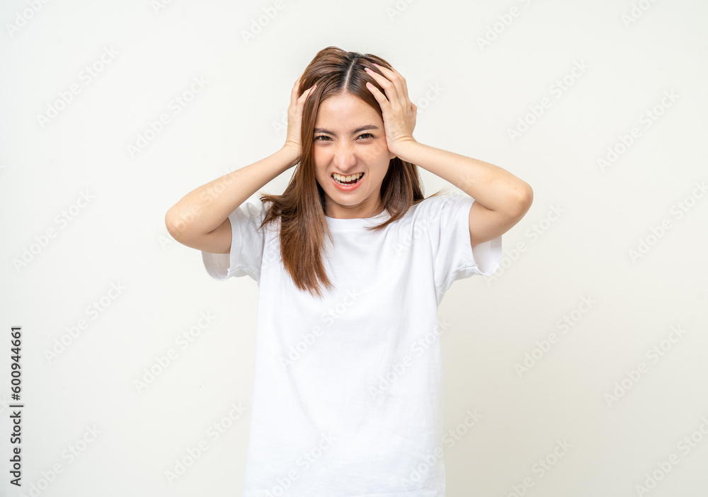 Young asian beautiful woman hand touching head she's feeling depressed stress headache be tired from working standing on isolated white background she has symptom office syndrome. Young asian beautiful woman hand touching head she's feeling depressed stress headache be tired from working standing on isolated white background she has symptom office syndrome.