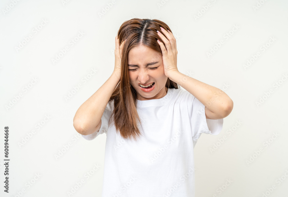 Young asian beautiful woman hand touching head she's feeling depressed stress headache be tired from working standing on isolated white background she has symptom office syndrome. Young asian beautiful woman hand touching head she's feeling depressed stress headache be tired from working standing on isolated white background she has symptom office syndrome.