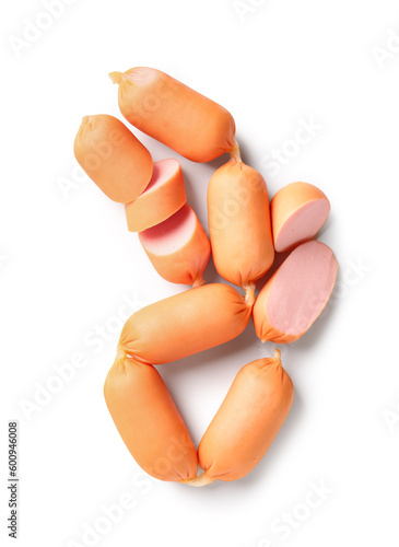 Small sausages and sliced p...