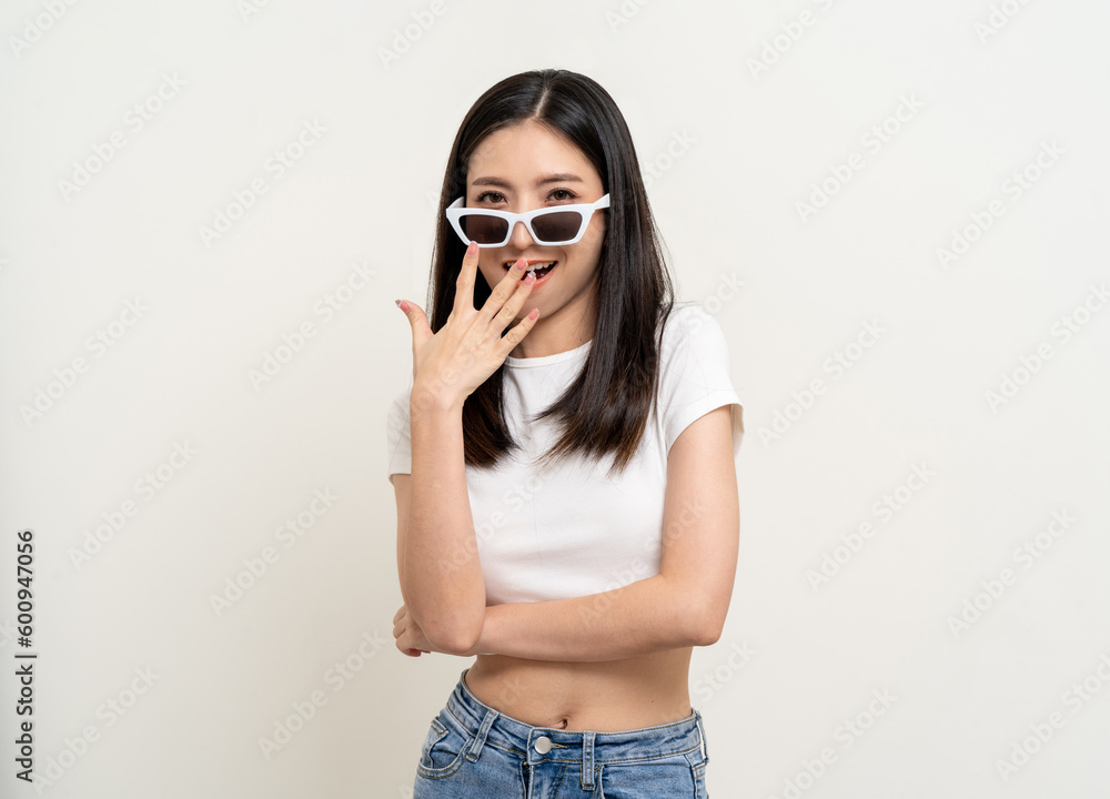 Attractive Beautiful asian woman standing and posing. Sexy female smiling happy fashion wearing sunglasses on isolated background. Attractive Beautiful asian woman standing and posing. Sexy female smiling happy fashion wearing sunglasses on isolated background.