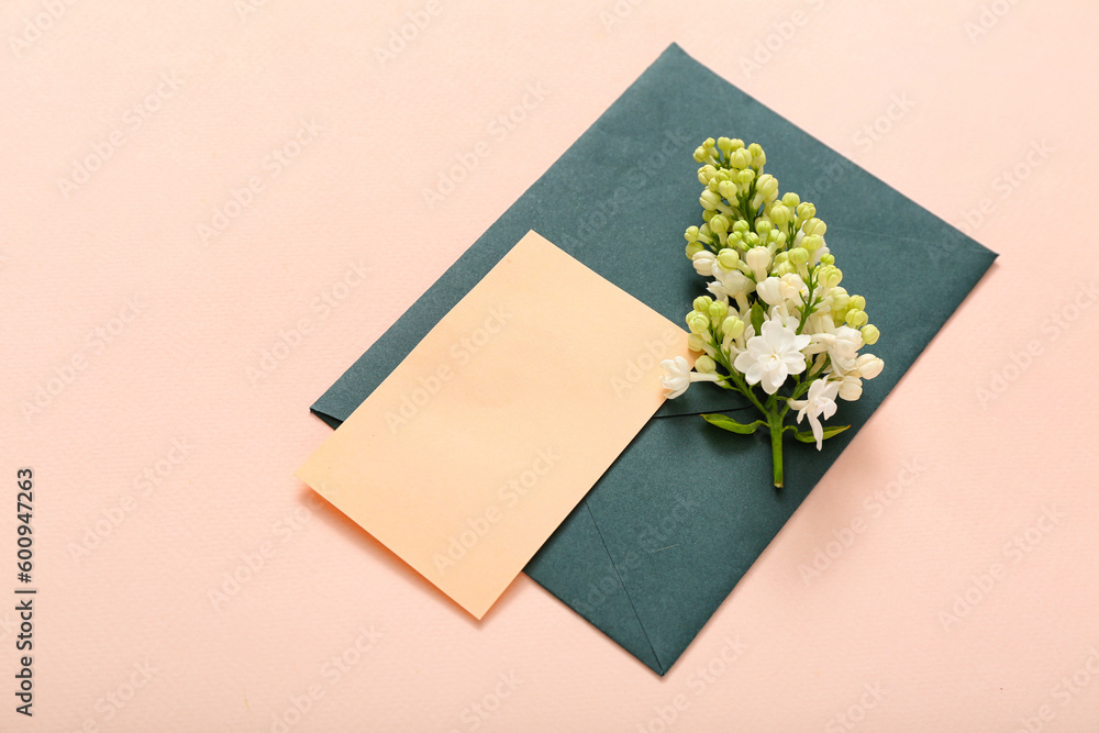 Blank cards and beautiful lilac flowers on pale pink background Blank cards and beautiful lilac flowers on pale pink background