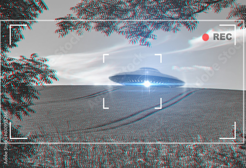 Fototapeta Naklejka Na Ścianę i Meble -  UFO, alien and camera viewfinder with a spaceship flying in the sky over area 51 for an invasion. Camcorder, spacecraft and conspiracy theory with a saucer on a display to record a sighting of aliens