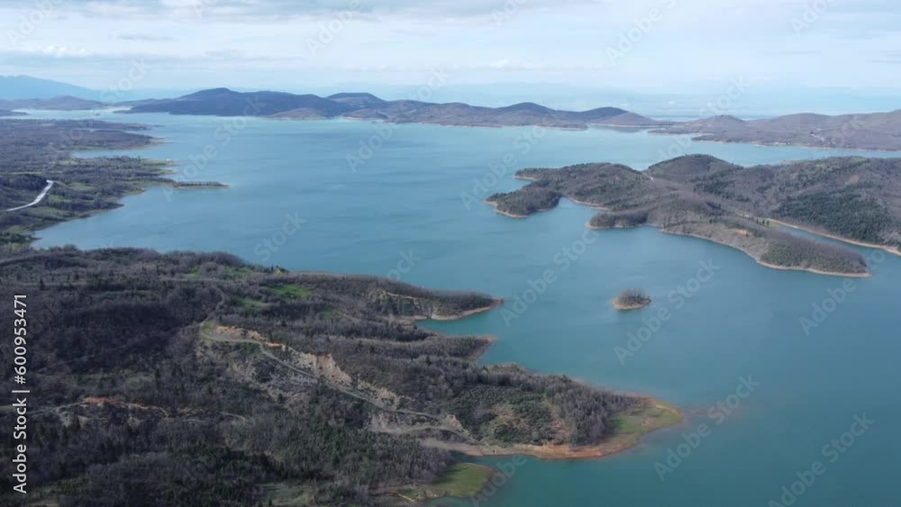 Slow cinematic aerial pan shot of lake Plastira in central Greece during a spring afternoon | 4K Slow cinematic aerial pan shot of lake Plastira in central Greece during a spring afternoon | 4K