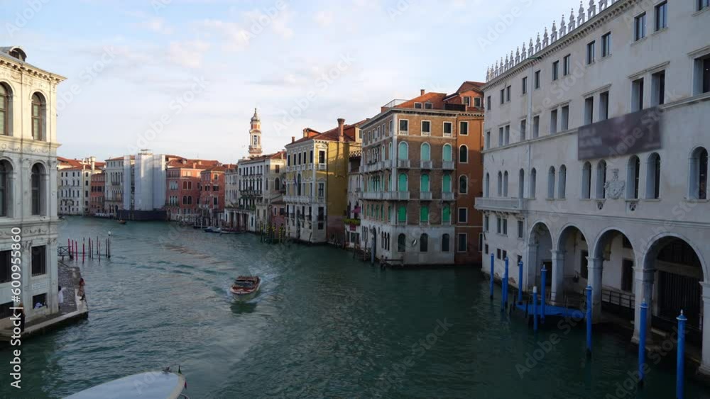 Boats move along the Grand Canal on a quiet evening in Venice Boats move along the Grand Canal on a quiet evening in Venice