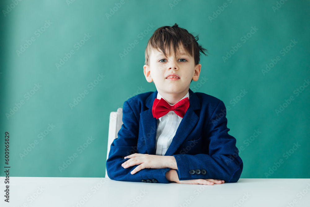 boy sitting at a desk at a school education knowledge school boy sitting at a desk at a school education knowledge school