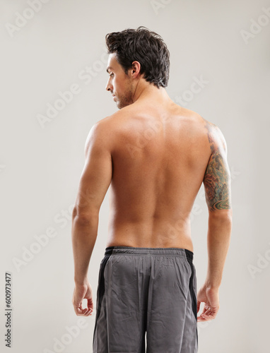 Back, results and a man for fitness and health isolated on a white background in a studio. Exercise, model and a person with progress from sports, workout and healthy lifestyle on a backdrop