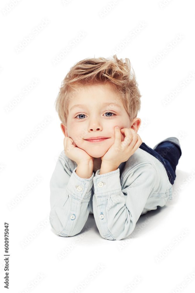Portrait, smile and boy lying down, relax and cheerful kid isolated against white studio background. Face, male child or young person with happiness, casual and chilling with joy, happy and confident Portrait, smile and boy lying down, relax and cheerful kid isolated against white studio background. Face, male child or young person with happiness, casual and chilling with joy, happy and confident