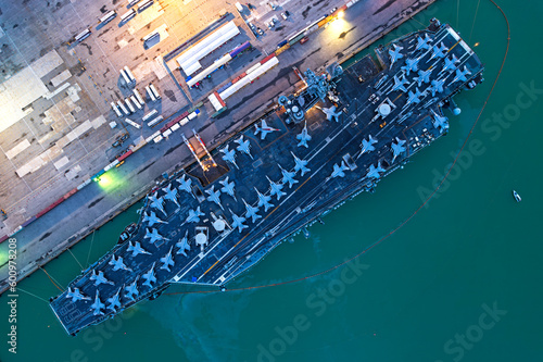 aerial view of Nuclear ship, Military navy ship carrier full loading fighter jet aircraft.