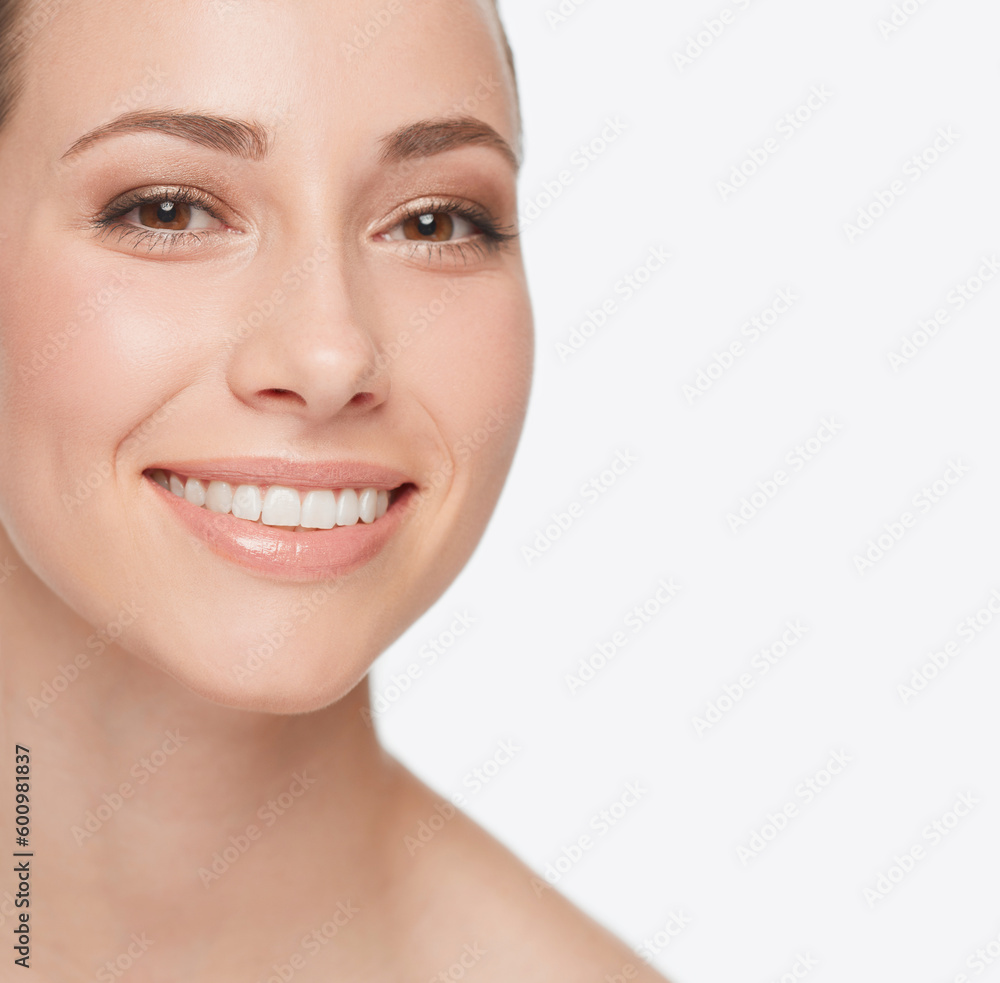 Smile, dental care and portrait of a woman with skincare isolated on a white background in studio. Happy, face and a young model showing teeth for oral hygiene with grooming for care of skin Smile, dental care and portrait of a woman with skincare isolated on a white background in studio. Happy, face and a young model showing teeth for oral hygiene with grooming for care of skin