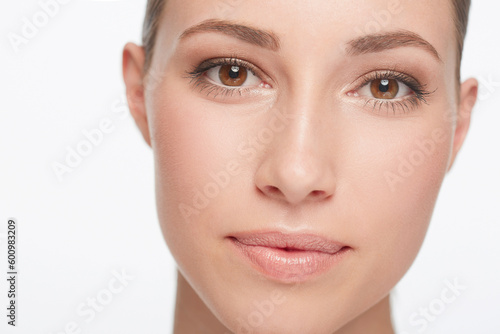 Portrait, beauty and woman with dermatology, skincare and confident girl isolated against a white studio background. Face, female person and model with organic facial, treatment and grooming routine