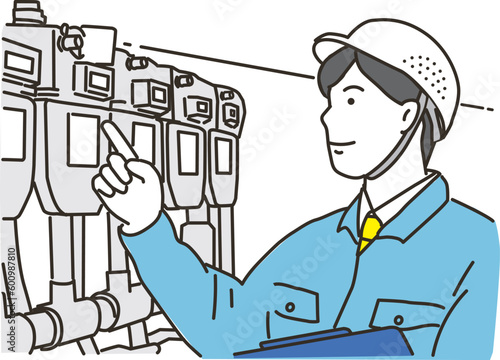 メーターを確認する男性の作業員
