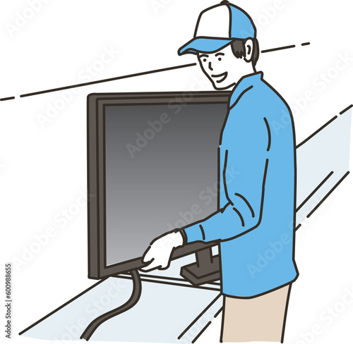 テレビを運ぶ作業員の男性
