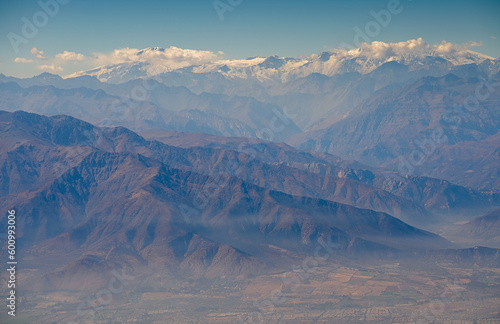 Andes Mountains from above. Aerial view with the amazing landscape of Andes next to Santiago Chile.