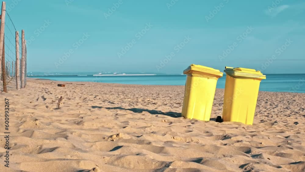 Yellow Plastic Dumpster Bins on Seashore Beach during Summer Vacation Season
Yellow Plastic Dumpster Bins on Seashore Beach during Summer Vacation Season