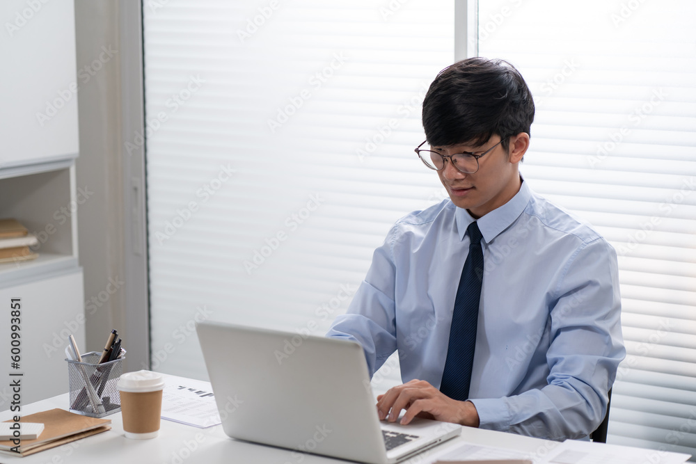 Business man working by using laptop computer Hands typing on a keyboard. Professional investor working new start up project. business planning in office. Technology business Business man working by using laptop computer Hands typing on a keyboard. Professional investor working new start up project. business planning in office. Technology business
