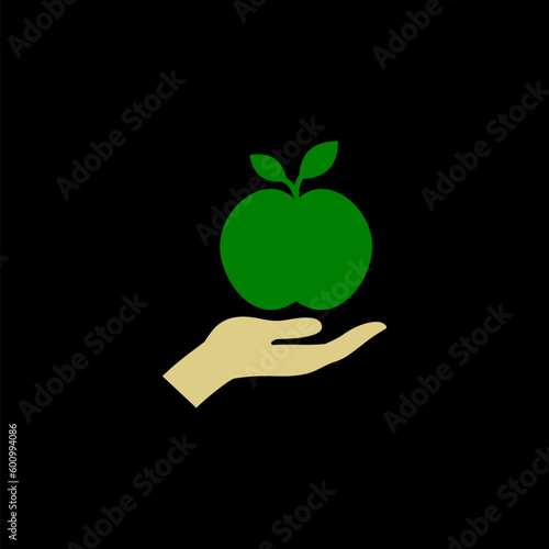  Green apple fruit icon,  aple hand isolated on black background  photo