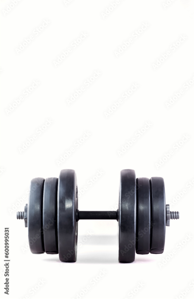Black barbell on a white background. Sports equipment. Black barbell on a white background. Sports equipment.