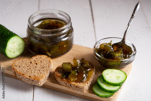 Healthy breakfast of bread with cucumber and fresh cucumber jam.