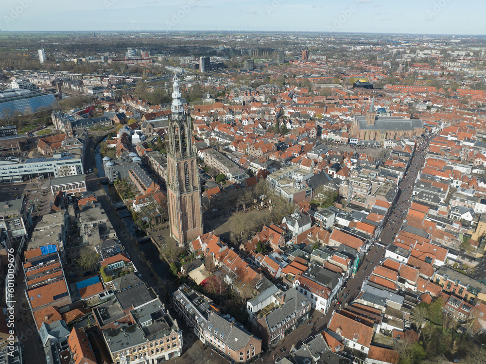 Obraz premium The towering church spire of Onze Lieve Vrouwetoren rises above the charming medieval city of Amersfoort.