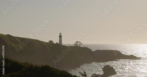 Yaquina Head Lighthouse at Sunset, Oregon Coast evening shot, peaceful Depoe Bay Scene, Newport, Oregon Beaches photo