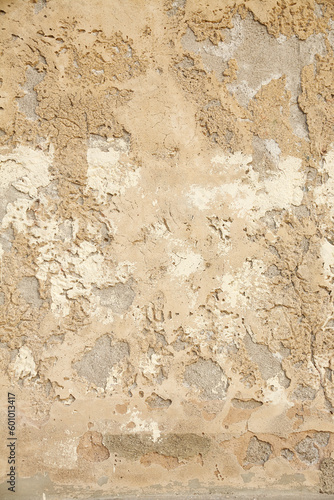 Nahaufnahme einer Mauer in Sizilien mit rauer Strutur beziehungsweise Vertiefungen durch abbröckelung des Verputzes.