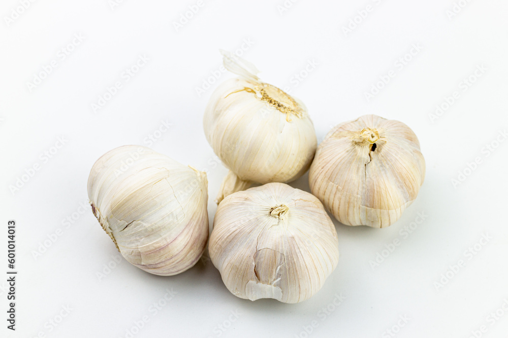 Garlic isolated on white background. Clipping path included for easy extraction. Garlic isolated on white background. Clipping path included for easy extraction.