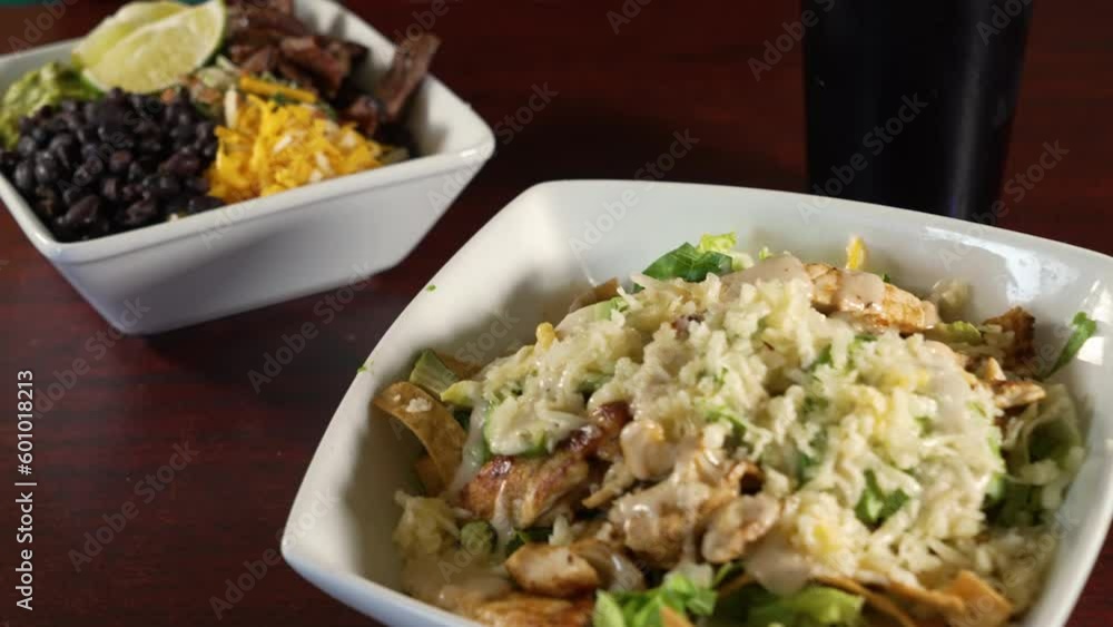 Two restaurant salad options, beef fajita taco salad, chicken fajita salad, slider 4K Two restaurant salad options, beef fajita taco salad, chicken fajita salad, slider 4K
