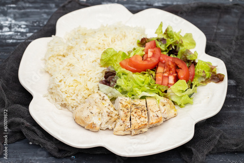 Diet food. Chicken breast with boiled rice and salad. Healthy lifestyle. Sports nutrition.