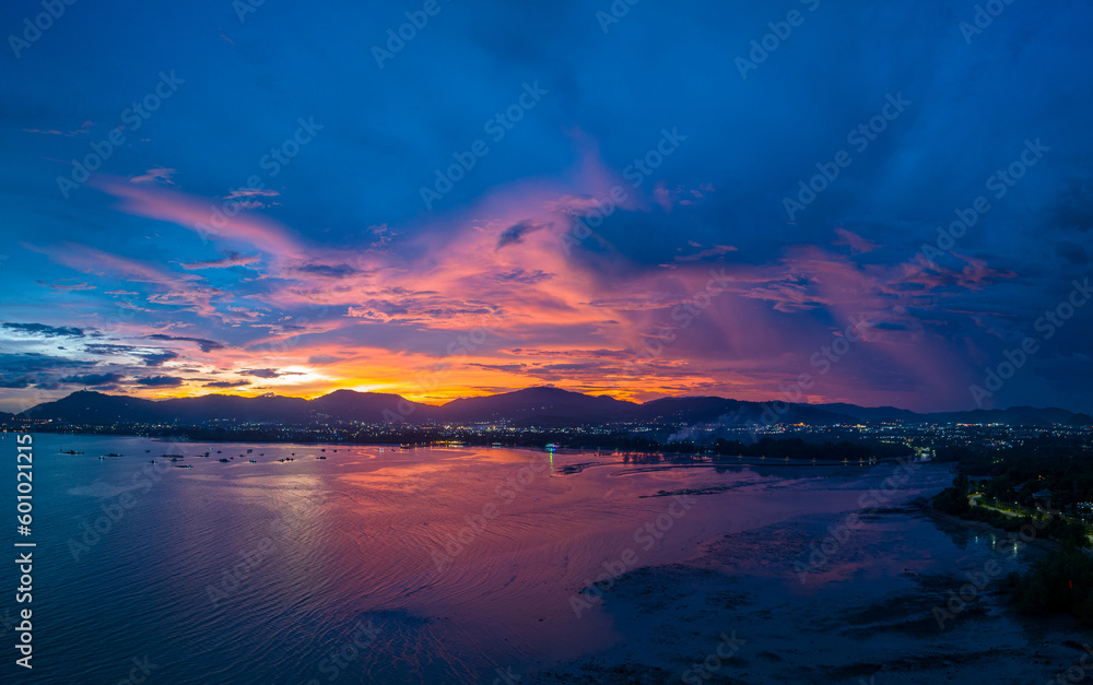..aerial view reflection of colorful cloud in bright sky of sunset above the ocean at Khao Khad Phuket. .Majestic sunset or sunrise landscape Amazing light of nature background. 