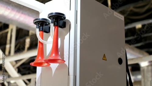Double air horn in sports arena