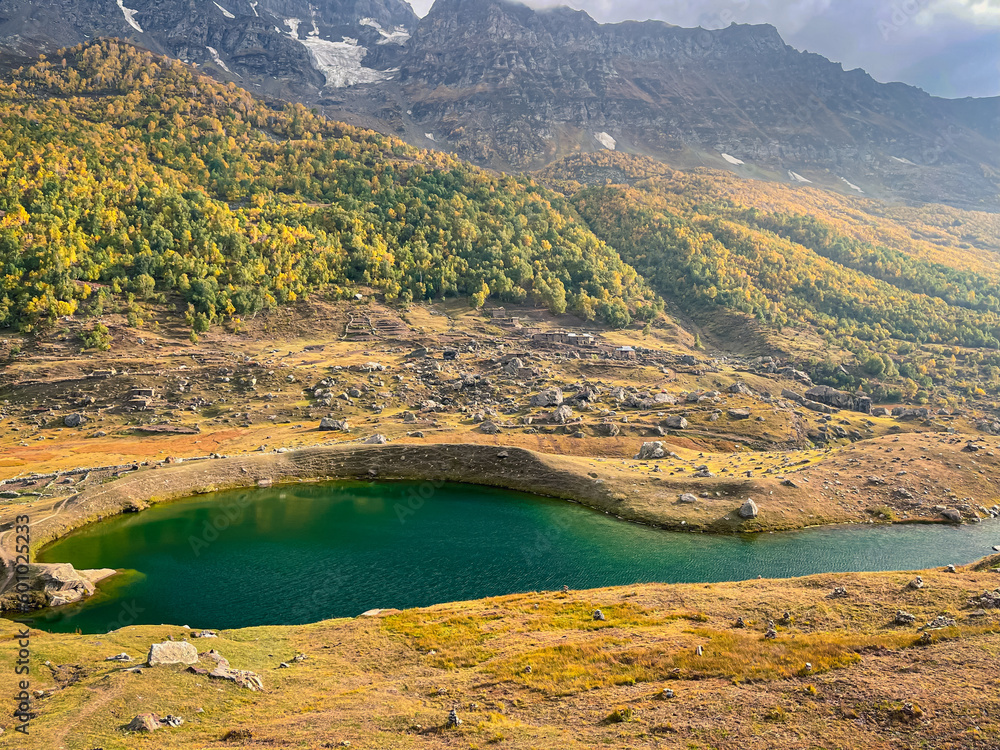 Fototapeta premium Spoon Lake, Shounter valley; its an adventurous 3.5 hours journey from kel, its a spoon shaped magnificent natural lake, just beneath Hari parbat (The mountain that never surrendered to anyone).