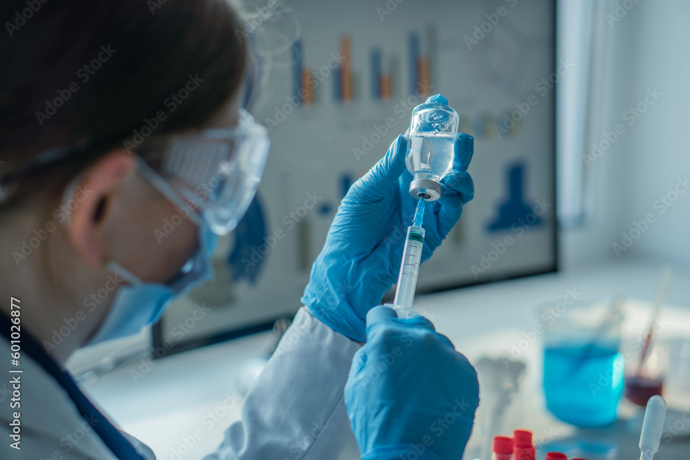 Scientist is researching drugs in chemical laboratory, hoping to find new methods of treating diseases. Doctor makes an injection with medication to patient to improve his health and help in treatment Scientist is researching drugs in chemical laboratory, hoping to find new methods of treating diseases. Doctor makes an injection with medication to patient to improve his health and help in treatment