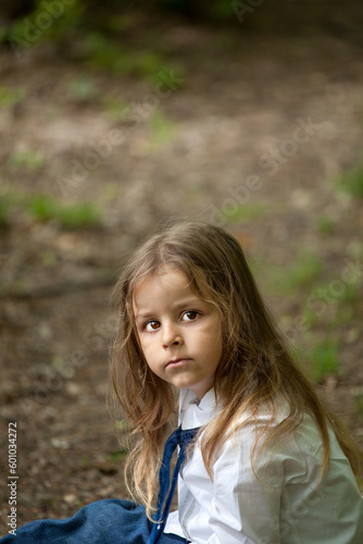 boy with long hair posing