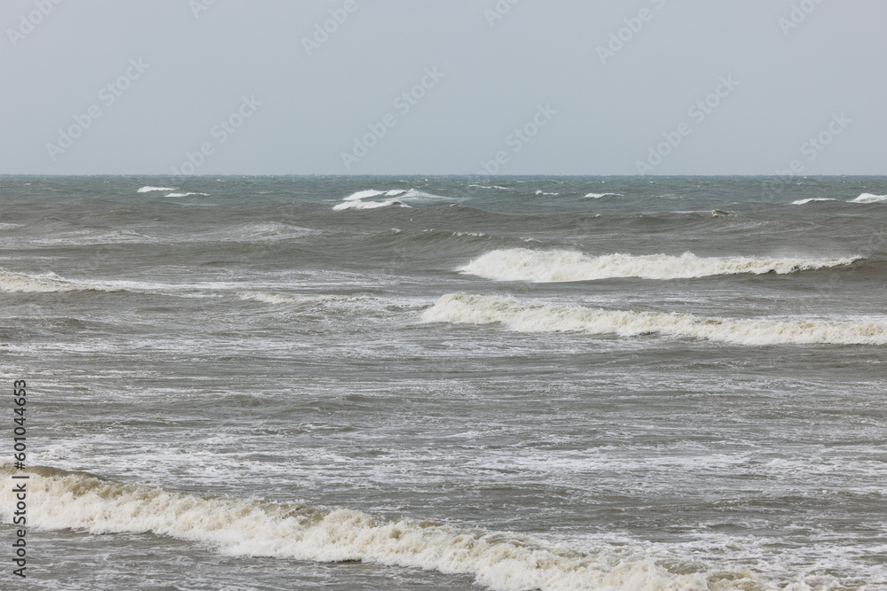 Big sea wave crashing at coastline