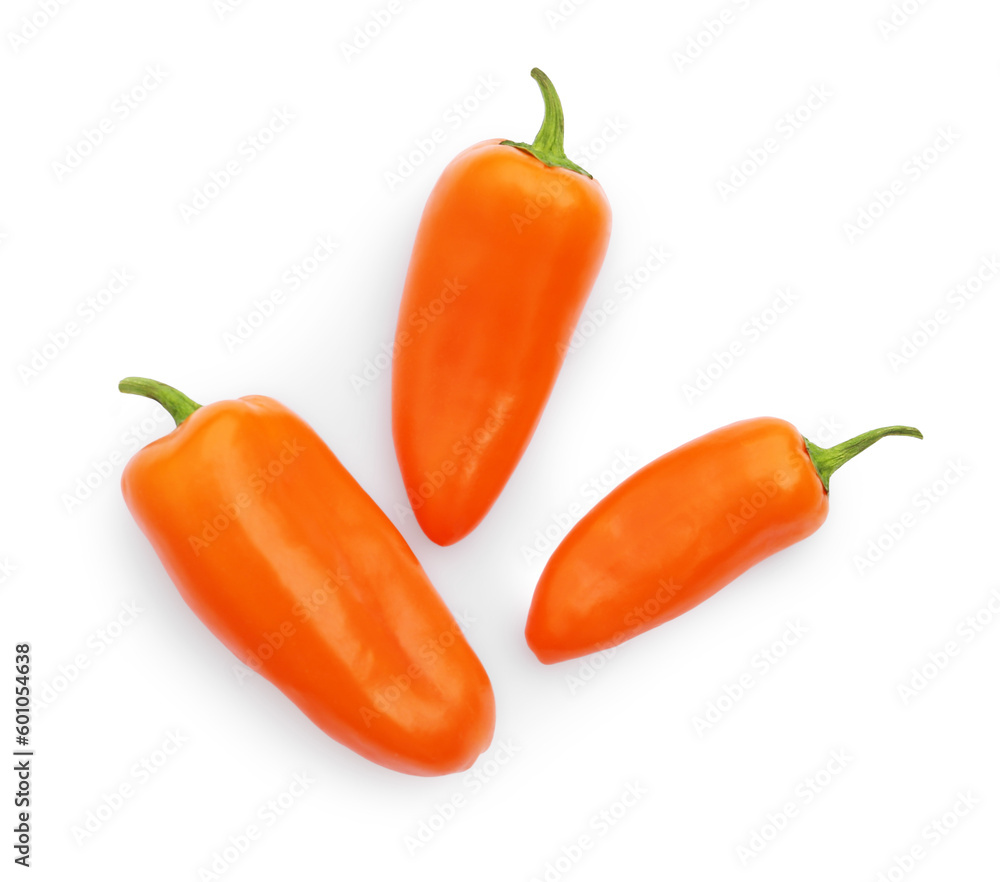 Fresh raw orange hot chili peppers isolated on white, top view Fresh raw orange hot chili peppers isolated on white, top view