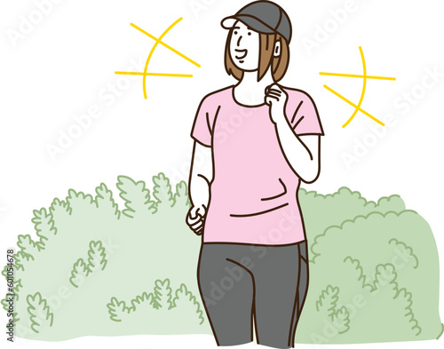 屋外で笑顔でジョギングする若い女性
