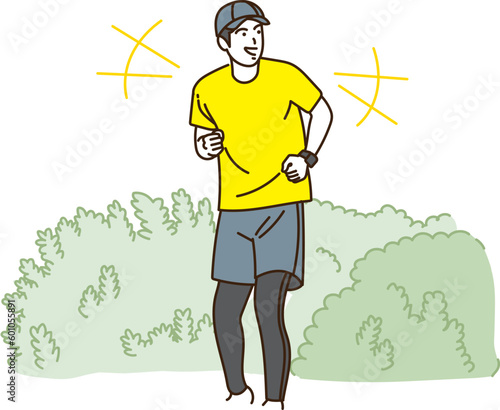 屋外で笑顔でジョギングする若い男性
