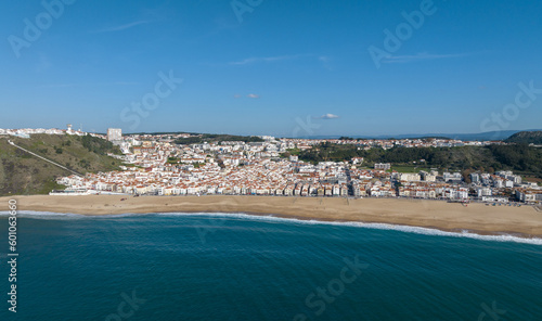 Nazare Town in Portugal. Beach and Cityscape. Drone Point of view.