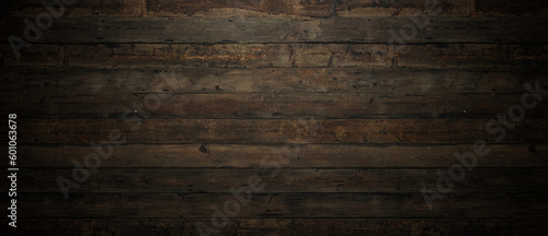 Horizontal old wooden planks and atmospheric light. Wood wall texture.