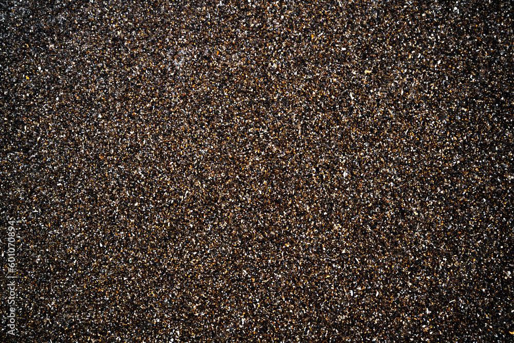 Feiner feuchter Kies am Strand als Hintergrundbild Feiner feuchter Kies am Strand als Hintergrundbild