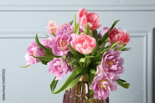 Wallpaper Mural Beautiful bouquet of colorful tulip flowers near light grey wall, closeup Torontodigital.ca