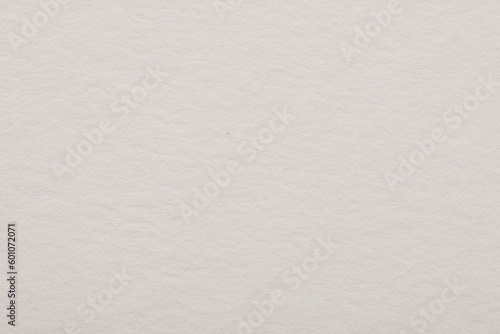 Texture of light grey paper sheet as background, top view